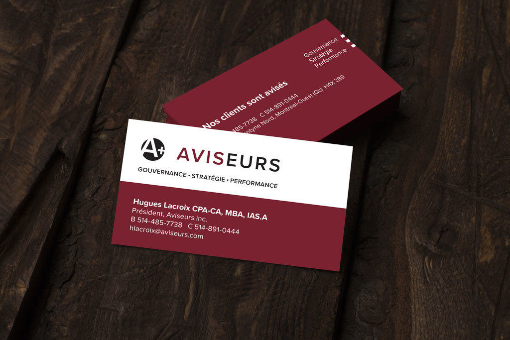 Aviseurs business cards on wood table