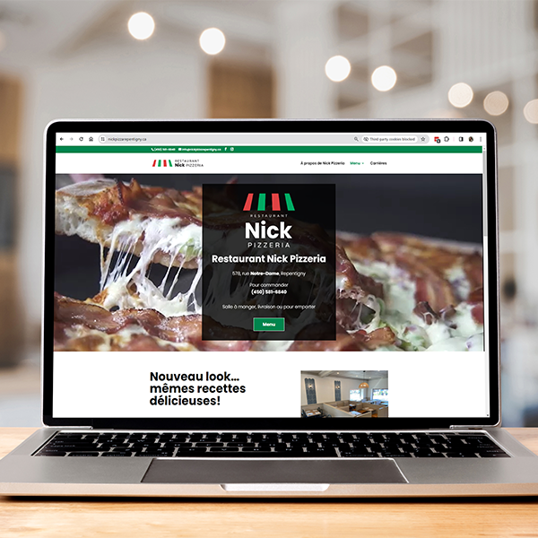 Nick Pizzeria website on laptop
